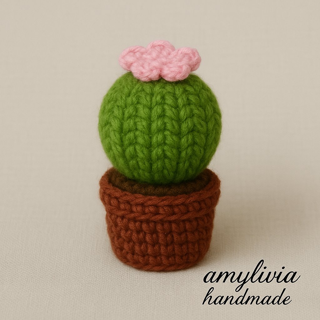 Easy amigurumi cactus – finished crochet project with pink flower on top
