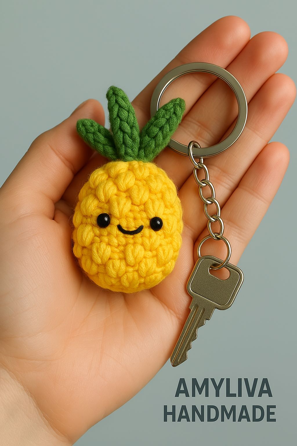 Handmade Pineapple Keychain – A Tropical and Adorable Touch* This handmade pineapple keychain brings a vibrant tropical vibe with its bright yellow and green tones. Featuring tiny black eyes and a sweet smile, this design stands out with its charming look. Carefully crocheted details highlight fine craftsmanship, while the metal ring makes it easy to use. *Features:* - *Material:* Cotton crochet yarn - *Details:* Secure eyes, finely crafted leaf accents - *Usage:* Perfect for attaching to bags, keys, or gifting - *Brand:* Labeled "AMYLIVA HANDMADE" as an original design If you love handmade creations, this cute pineapple would be a great addition to your collection! 🍍✨