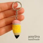 Step-by-step crochet pattern showing how to make a mini amigurumi pencil keychain with single crochet stitches, increases, and decreases, finished with a keyring – AmyLiva Handmade.